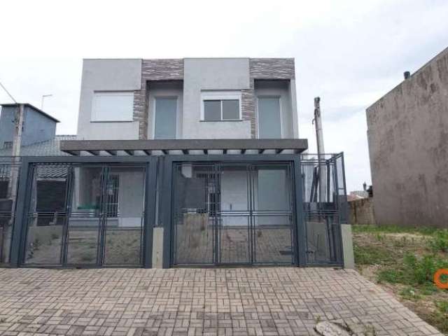 Casa com 3 dormitórios para alugar, 125 m² por R$ 2.870,00/mês - Guarujá - Porto Alegre/RS