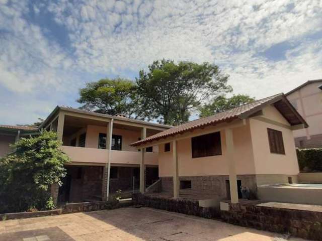 Casa com 4 dormitórios para alugar, 400 m² por R$ 6.090,01/mês - Aberta dos Morros - Porto Alegre/RS