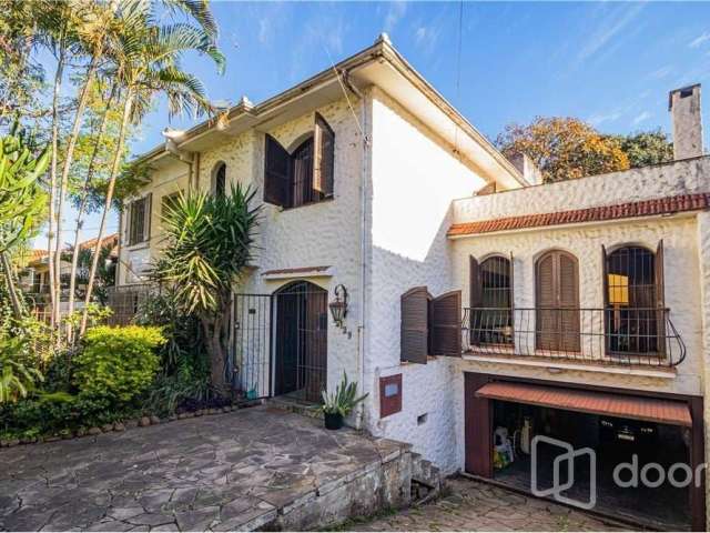 Casa com 5 quartos à venda na Rua Professor Ivo Corseuil, 129, Petrópolis, Porto Alegre, 400 m2 por R$ 1.350.000