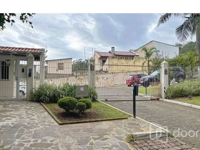 Casa em condomínio fechado com 3 quartos à venda na Rua Professora Thereza Noronha, 125, Espírito Santo, Porto Alegre, 102 m2 por R$ 321.000