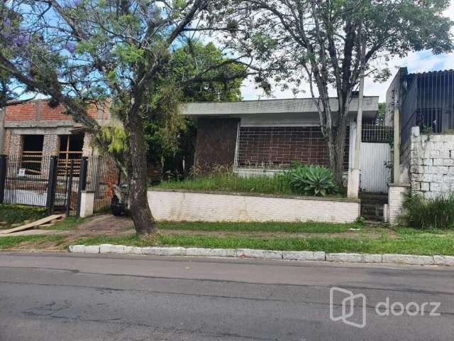 Casa com 2 quartos à venda na Rua Carlos Huber, 755, Três Figueiras, Porto Alegre, 142 m2 por R$ 1.100.000