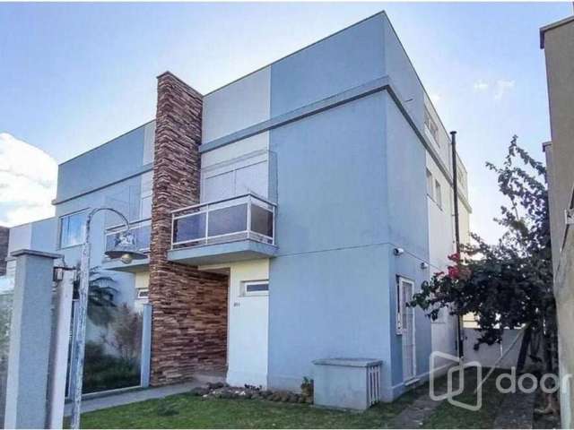 Casa em condomínio fechado com 3 quartos à venda na Rua José Elias Flores, 211, Lomba do Pinheiro, Porto Alegre, 120 m2 por R$ 530.000