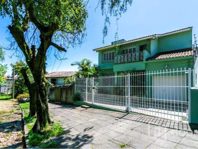 Casa com 4 quartos à venda na Rua Doutor Rodrigues Alves, 145, Chácara das Pedras, Porto Alegre, 300 m2 por R$ 1.158.000