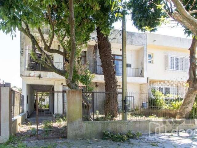 Casa com 4 quartos à venda na Rua General Rondon, 362, Tristeza, Porto Alegre, 220 m2 por R$ 750.000