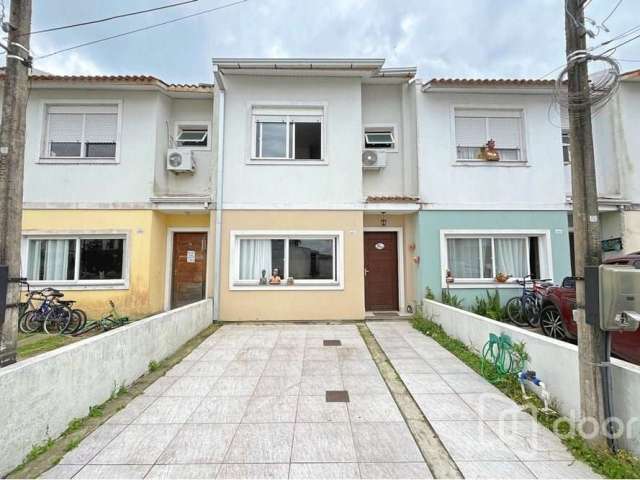 Casa em condomínio fechado com 3 quartos à venda na Avenida Edgar Pires de Castro, 2520, Hípica, Porto Alegre, 144 m2 por R$ 385.000