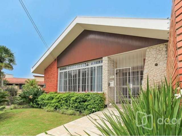 Casa com 3 quartos à venda na Rua Luiz Voelcker, 411, Três Figueiras, Porto Alegre, 358 m2 por R$ 2.400.000