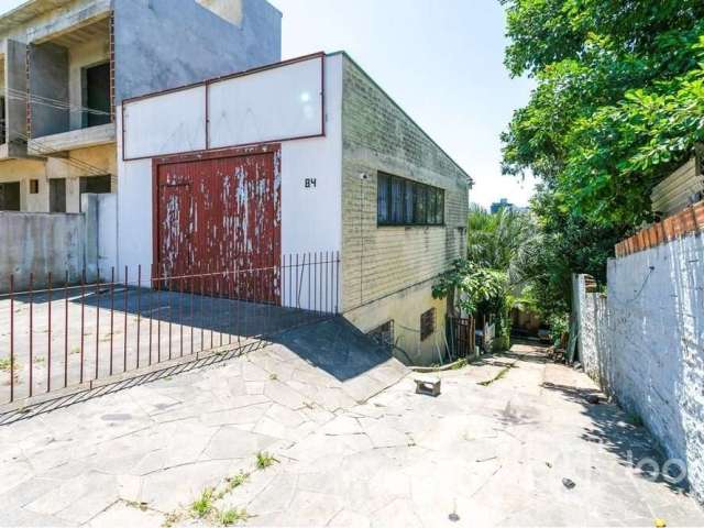 Casa com 3 quartos à venda na Rua Paul Harris, 84, Jardim Itu Sabará, Porto Alegre, 170 m2 por R$ 460.000