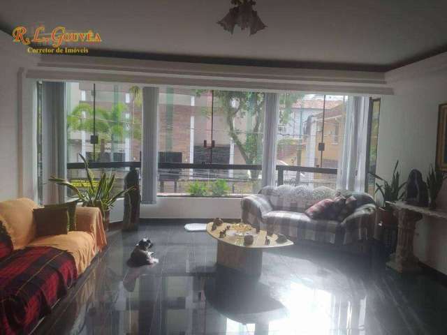 Casa com 3 dormitórios à venda por R$ 1.500.000,00 - Gonzaga - Santos/SP