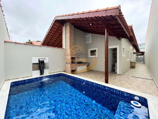 Linda casa geminada lado praia com piscina e churrasqueira em mongaguá