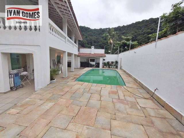 Sobrado com 4 dormitórios à venda, 272 m² por R$ 1.400.000,00 - Guaiuba - Guarujá/SP