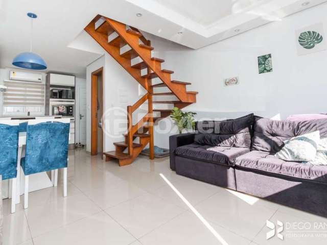 Casa em condomínio fechado com 2 quartos à venda na Rua Capitão Pedroso, 416, Restinga, Porto Alegre, 82 m2 por R$ 245.000