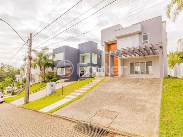 Casa em condomínio fechado com 3 quartos à venda na Avenida Senador Salgado Filho, 8500, Jardim Krahe, Viamão, 197 m2 por R$ 1.390.000