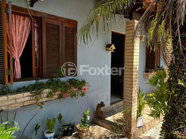 Casa com 3 quartos à venda na Rua das Adálias, 372, Cecília, Viamão, 180 m2 por R$ 437.000