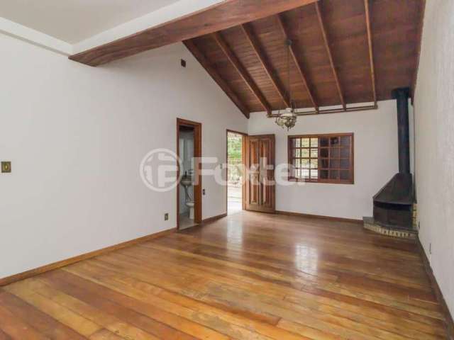 Casa com 3 quartos à venda na Rua Octávio de Souza, 1005, Nonoai, Porto Alegre, 252 m2 por R$ 590.000