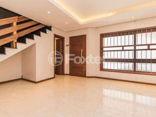 Casa com 3 quartos à venda na Rua Dom Jaime de Barros Câmara, 705, Sarandi, Porto Alegre, 235 m2 por R$ 980.000