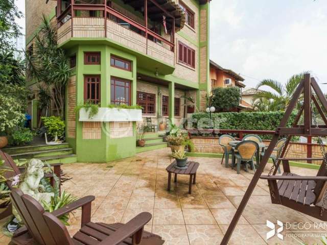 Casa com 3 quartos à venda na Rua Imeram Teixeira Cabeleira, 25, Ipanema, Porto Alegre, 267 m2 por R$ 1.050.000