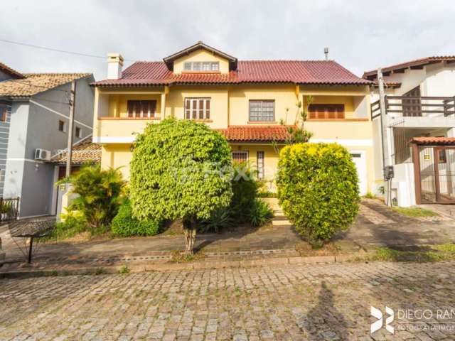 Casa com 3 quartos à venda na Rua Kyve T. Knijnik, 20, Espírito Santo, Porto Alegre, 321 m2 por R$ 750.000