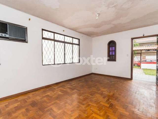 Casa com 3 quartos à venda na Rua Santa Flora, 1159, Nonoai, Porto Alegre, 240 m2 por R$ 807.000