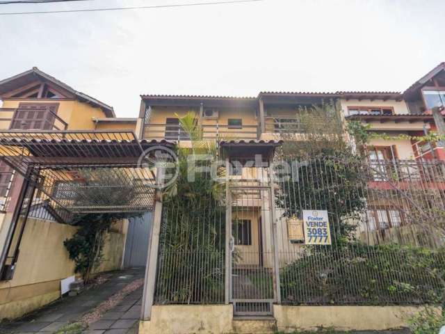 Casa com 5 quartos à venda na Rua Moacyr Godoy Ilha, 242, Espírito Santo, Porto Alegre, 359 m2 por R$ 745.000