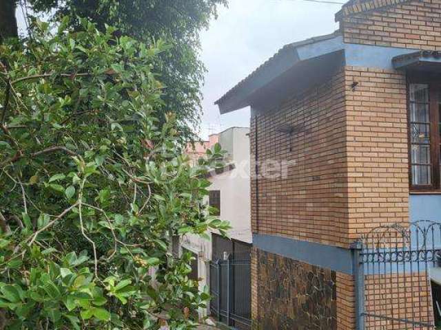 Casa com 3 quartos à venda na Avenida América, 268, Auxiliadora, Porto Alegre, 262 m2 por R$ 1.277.000