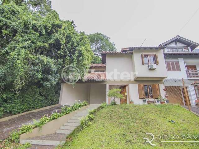 Casa com 3 quartos à venda na Rua Edgar Luiz Schneider, 12, Jardim Isabel, Porto Alegre, 169 m2 por R$ 560.000