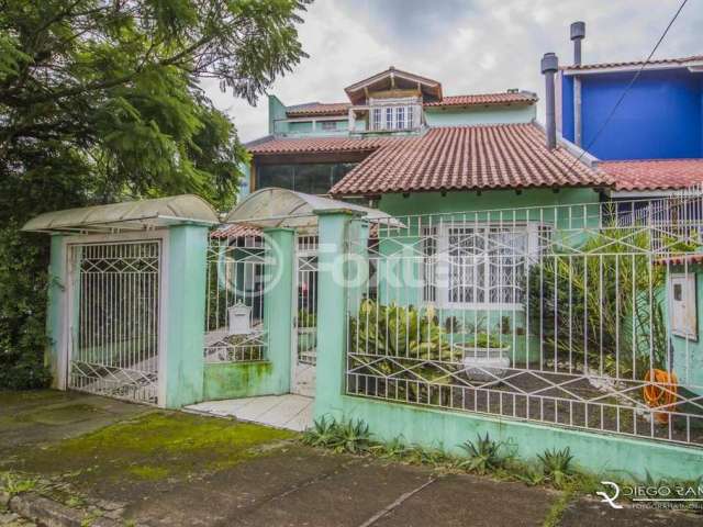 Casa com 3 quartos à venda na Rua Luiz João Pirotti, 60, Ipanema, Porto Alegre, 407 m2 por R$ 990.000