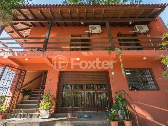 Casa com 4 quartos à venda na Avenida dos Prazeres, 886, Vila Jardim, Porto Alegre, 528 m2 por R$ 1.757.500