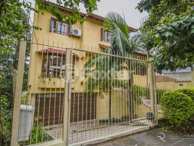 Casa com 4 quartos à venda na Rua Caieira, 433, Medianeira, Porto Alegre, 221 m2 por R$ 630.000