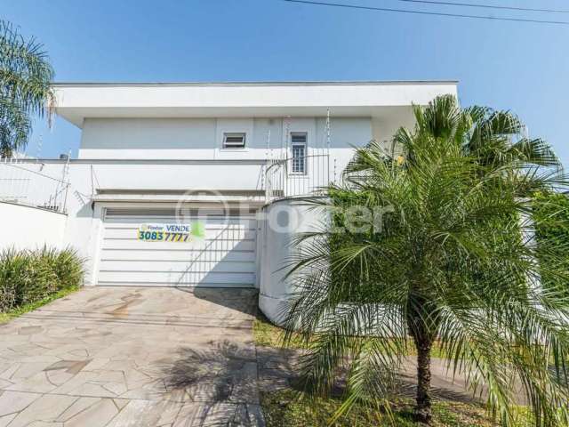 Casa com 3 quartos à venda na Rua País de Gales, 153, Marechal Rondon, Canoas, 245 m2 por R$ 3.000.000