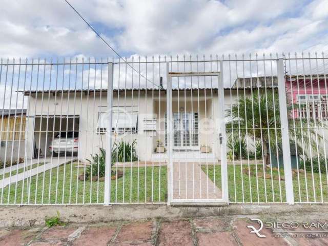 Casa com 3 quartos à venda na Rua Mathilde Zatar, 158, Nonoai, Porto Alegre, 150 m2 por R$ 430.000