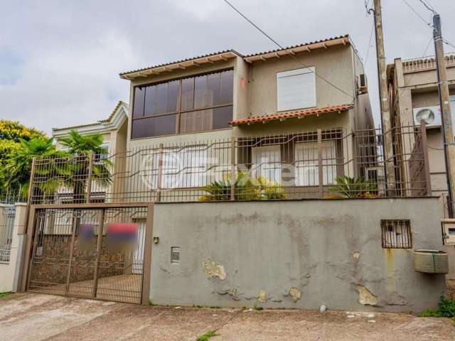 Casa com 4 quartos à venda na Avenida Nilo Ruschel, 722, Morro Santana, Porto Alegre, 270 m2 por R$ 950.000