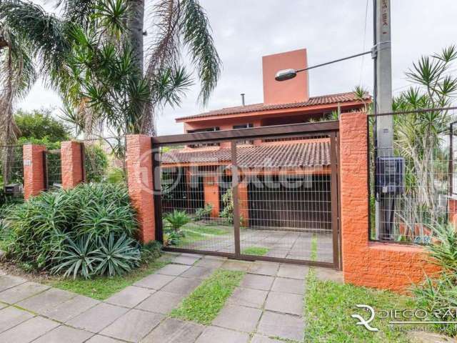 Casa com 4 quartos à venda na Rua General Tadeusz Kosciuszko, 160, Jardim Isabel, Porto Alegre, 245 m2 por R$ 1.300.000