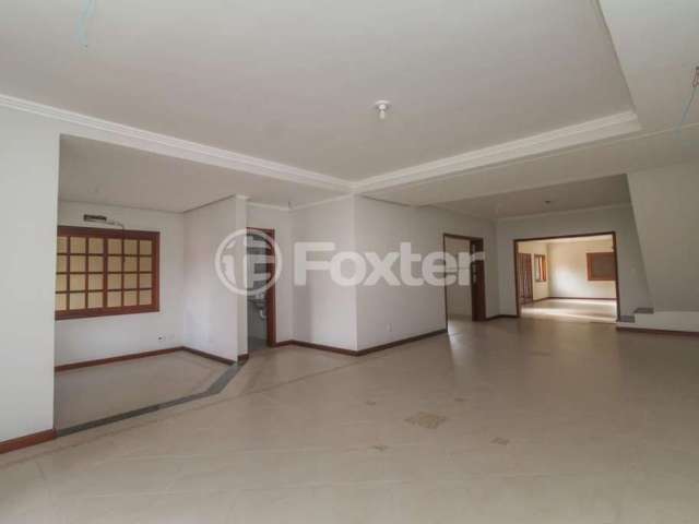 Casa com 3 quartos à venda na Rua Oiampi, 90, Guarujá, Porto Alegre, 388 m2 por R$ 860.000