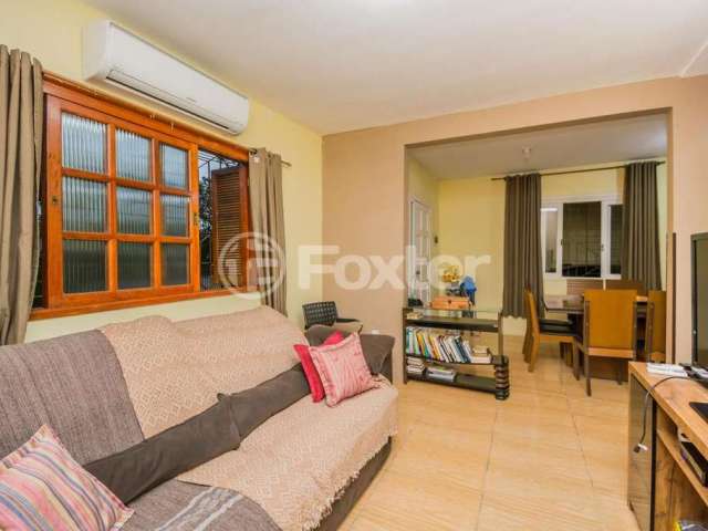 Casa com 3 quartos à venda na Rua Bartolomeu Dias, 556, Jardim Itu Sabará, Porto Alegre, 221 m2 por R$ 990.000