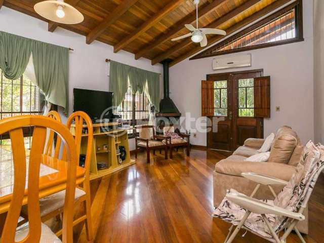 Casa com 3 quartos à venda na Rua Emílio Dimari, 65, Ponta Grossa, Porto Alegre, 180 m2 por R$ 712.500