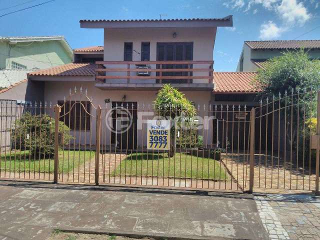 Casa com 4 quartos à venda na Rua Doutor Tancredo Neves, 231, Fátima, Canoas, 250 m2 por R$ 1.000.000