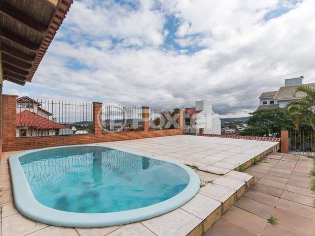 Casa com 4 quartos à venda na Rua Kyve T. Knijnik, 15, Espírito Santo, Porto Alegre, 246 m2 por R$ 1.060.000