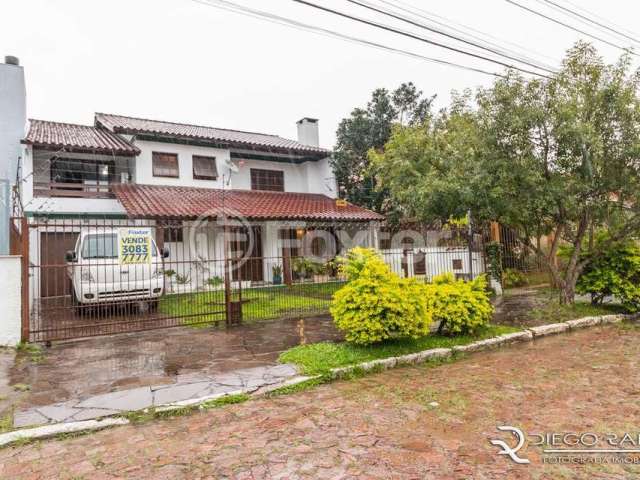 Casa com 4 quartos à venda na Rua Waldomiro Schapke, 311, Partenon, Porto Alegre, 260 m2 por R$ 803.225