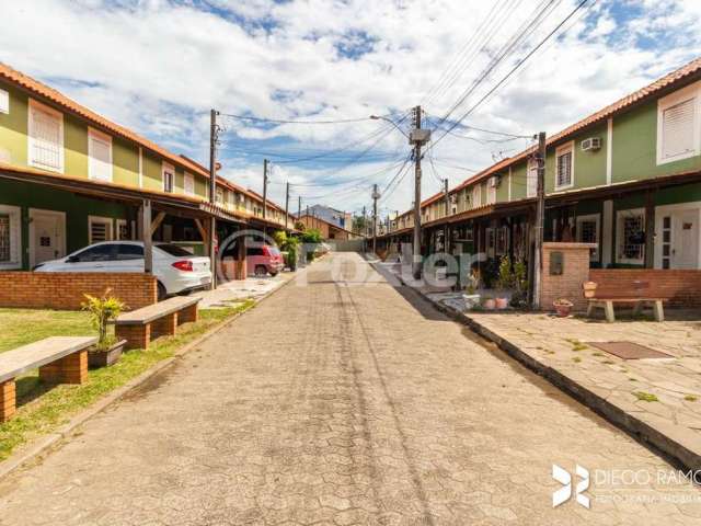 Casa em condomínio fechado com 2 quartos à venda na Avenida Juca Batista, 3621, Hípica, Porto Alegre, 85 m2 por R$ 250.000