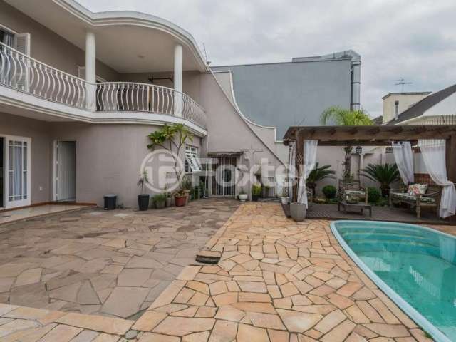 Casa com 4 quartos à venda na Avenida Doutor Sezefredo Azambuja Vieira, 2048, Estância Velha, Canoas, 257 m2 por R$ 1.605.000