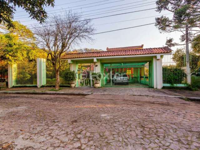 Casa com 3 quartos à venda na Rua Doutor Raul Franco Di Primio, 115, Teresópolis, Porto Alegre, 387 m2 por R$ 1.748.950