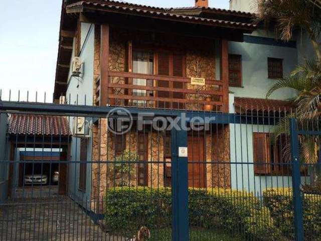 Casa com 4 quartos à venda na Rua Ararás, 344, Sarandi, Porto Alegre, 292 m2 por R$ 1.200.000