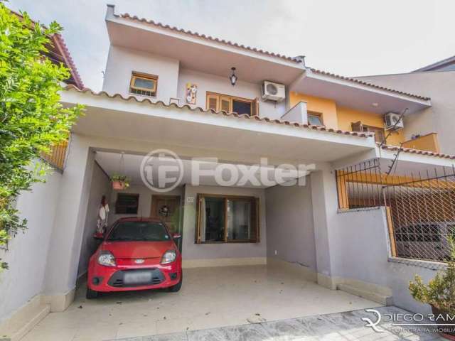 Casa com 3 quartos à venda na Rua Heitor Kramer, 303, Guarujá, Porto Alegre, 164 m2 por R$ 550.000