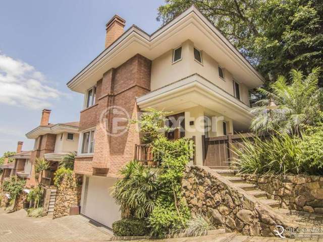 Casa em condomínio fechado com 3 quartos à venda na Avenida Coronel Marcos, 760, Pedra Redonda, Porto Alegre, 342 m2 por R$ 1.780.000