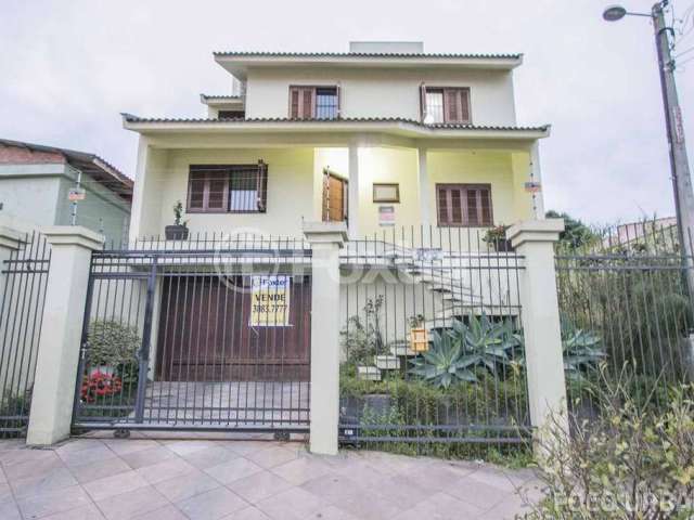 Casa com 6 quartos à venda na Rua Dormênio, 105, Santa Tereza, Porto Alegre, 429 m2 por R$ 1.500.000