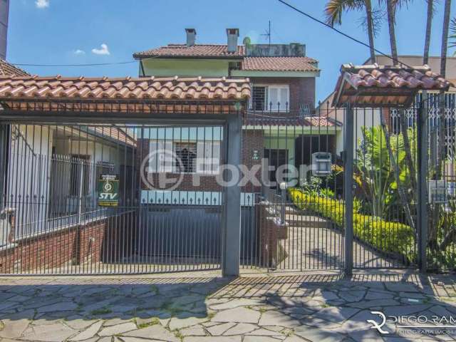 Casa com 3 quartos à venda na Rua Edmundo Bastian, 260, Cristo Redentor, Porto Alegre, 384 m2 por R$ 1.450.000