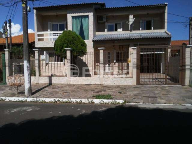Casa com 4 quartos à venda na Rua das Petúnias, 725, Estância Velha, Canoas, 298 m2 por R$ 904.000