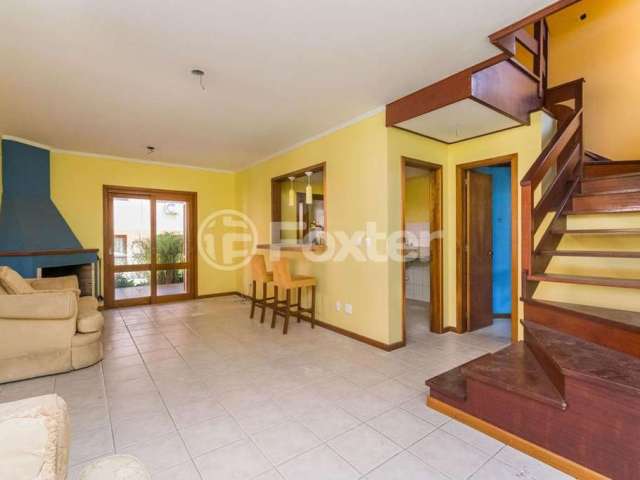 Casa em condomínio fechado com 3 quartos à venda na Rua Luís Felipe Monmany, 101, Espírito Santo, Porto Alegre, 132 m2 por R$ 550.000