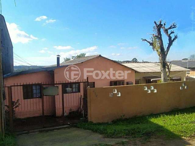 Casa com 3 quartos à venda na Rua Doze de Outubro, 474, Santo Onofre, Viamão, 60 m2 por R$ 180.000