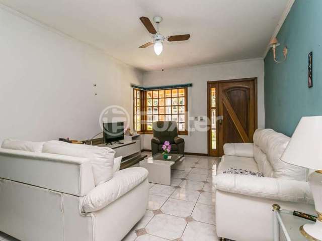 Casa com 5 quartos à venda na Rua Henrique Scliar, 143, Jardim Itu Sabará, Porto Alegre, 200 m2 por R$ 1.055.000